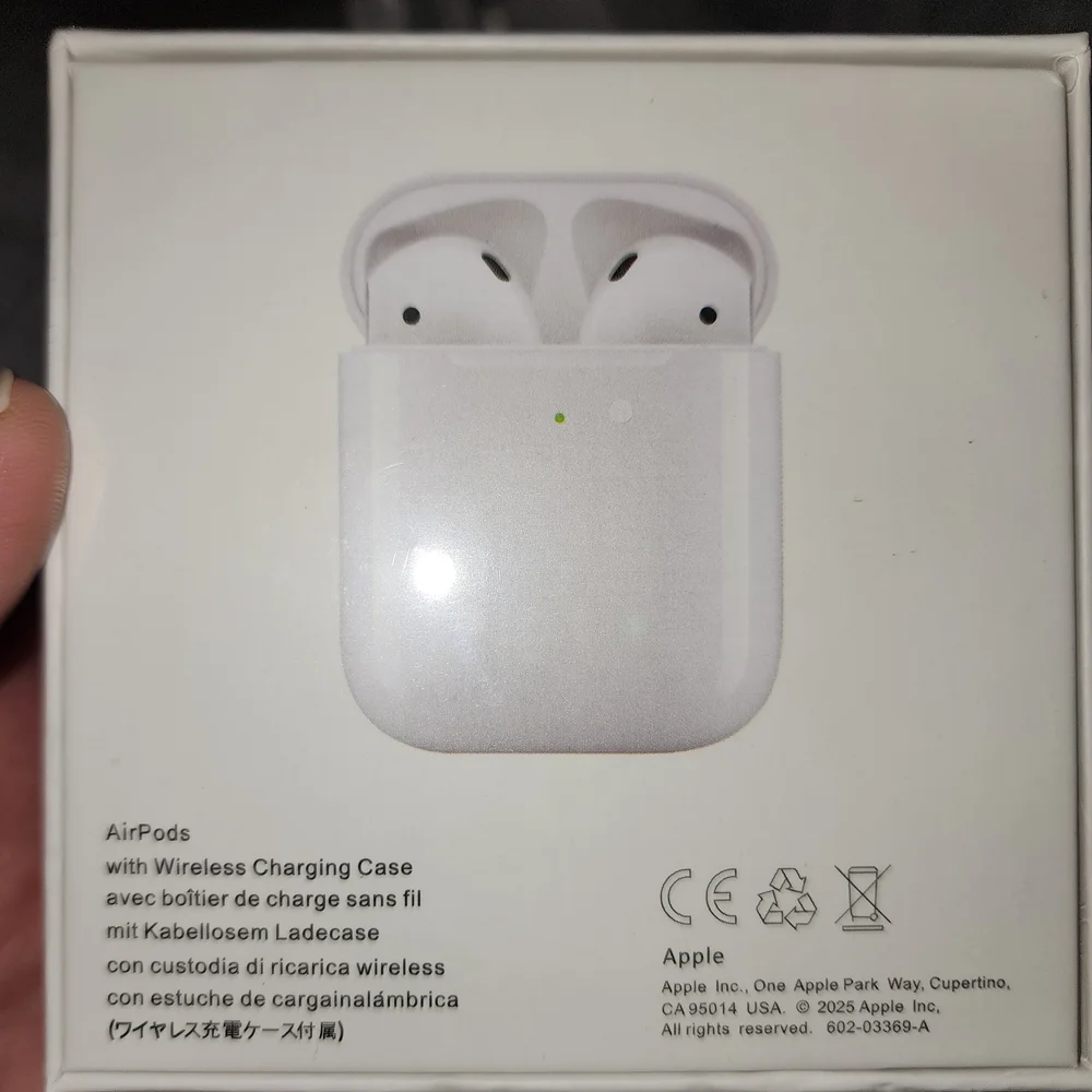 NWT AirPods With Wireless Charging Case White